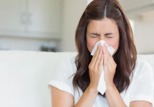 Ladylike ways to deal with sneezes and sniffles